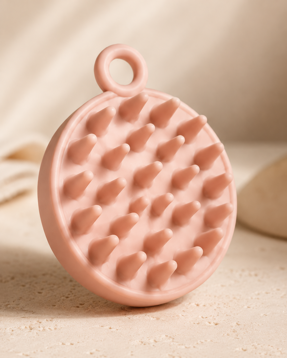 Soft pink silicone scalp massage brush close up for VeraCora Head Spa Kit